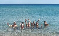 Kust zwemmen Helmen Sardinie Fietsreis Italie