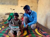 Jongen tablet Soedan UNICEF