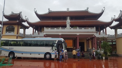 Vietnam bus with temple