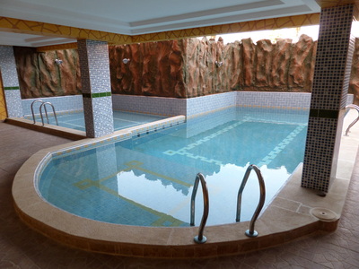 Marokko zwembad hotel Gomassine Marrakech djoser accommodatie 