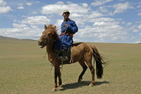 Man op paard Mongolië Trans Siberië express Djoser