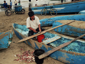 Puerto Lopez – boot met visser